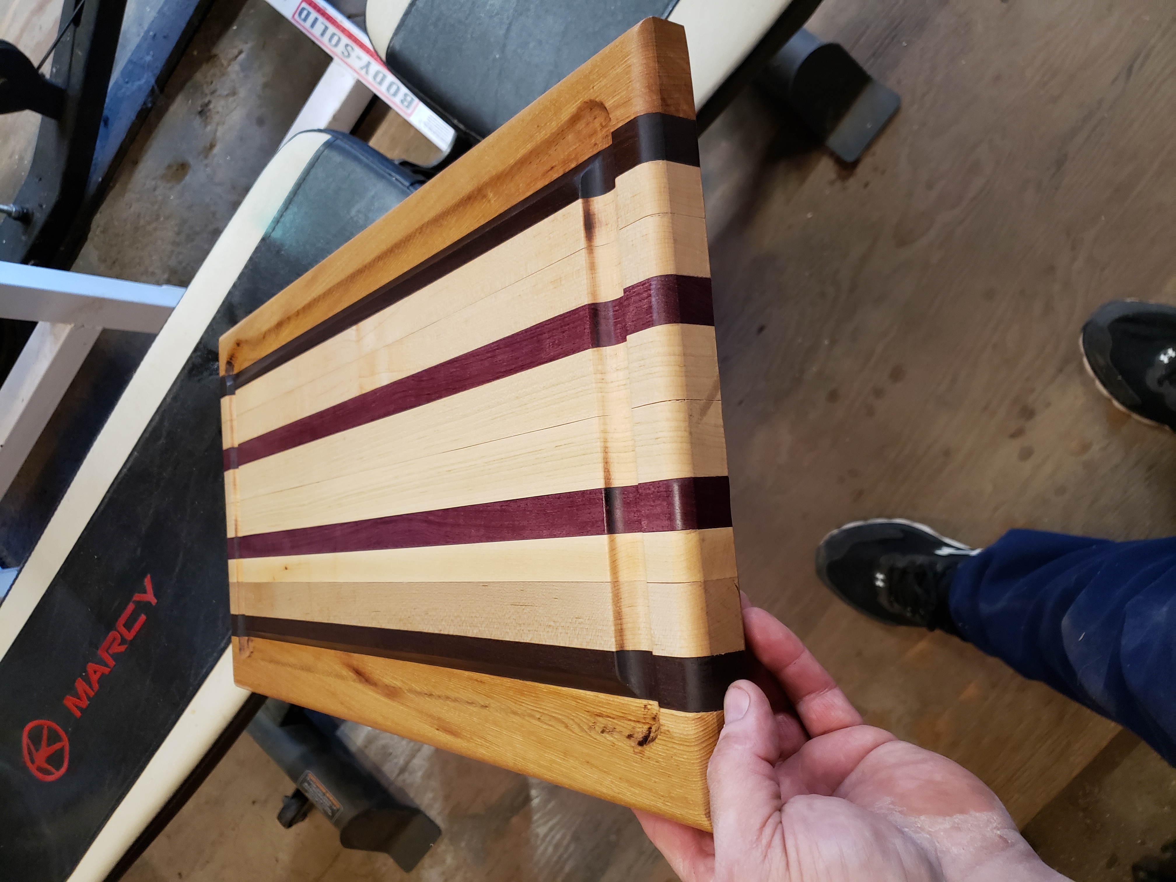 Multi-wood cutting board with purple heart and walnut