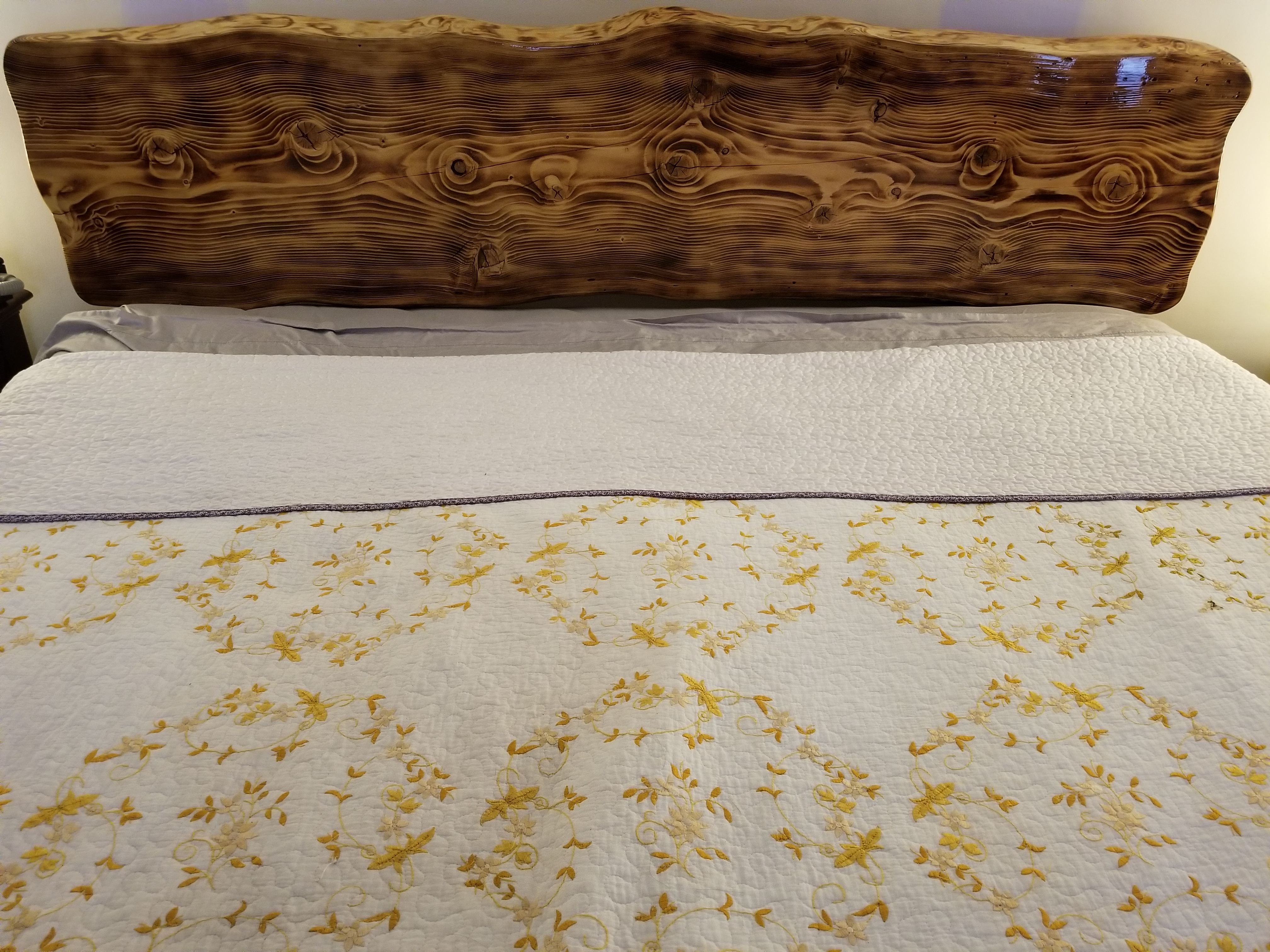 Live edge wood slab headboard - finished